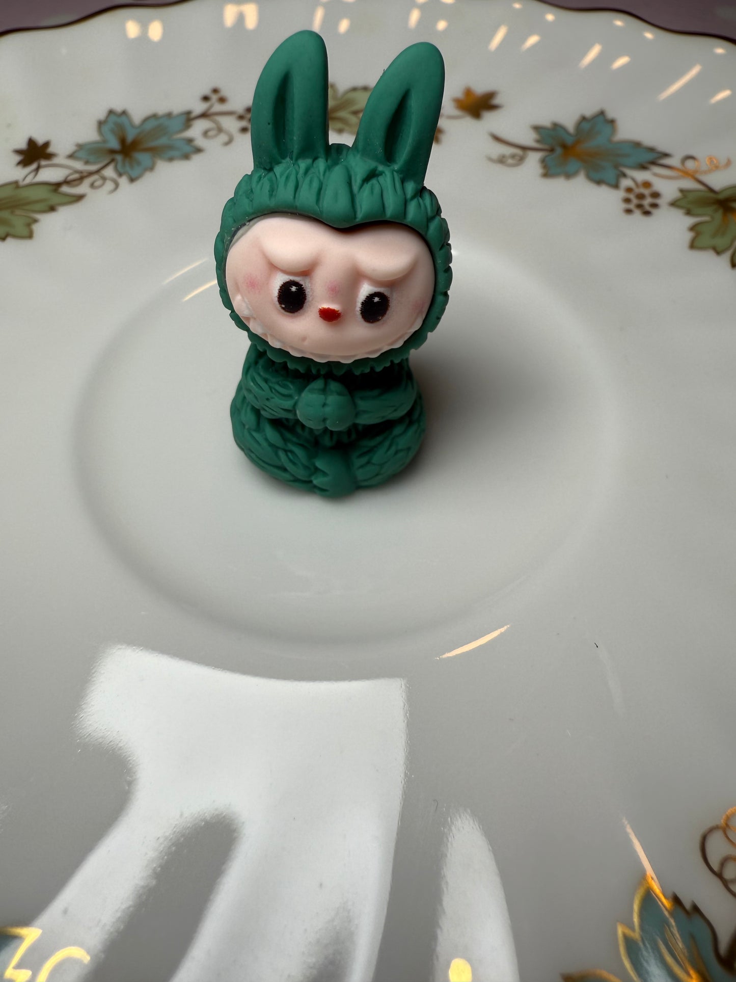 Green sitting Labubu
