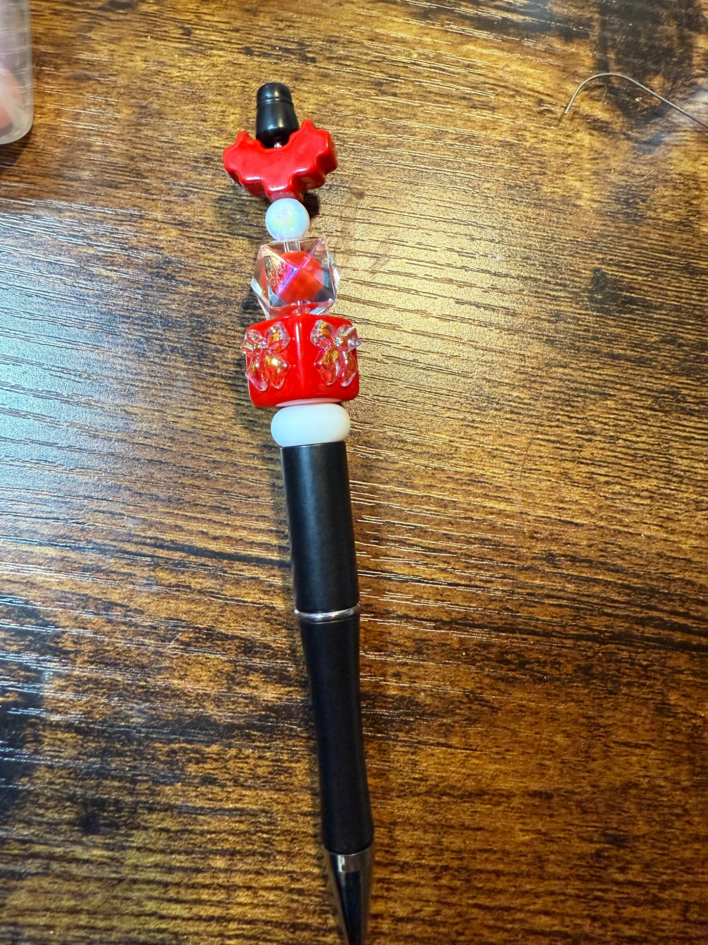 Red beaded pen